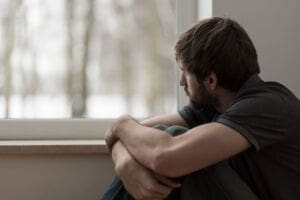 Man showing depressed signs