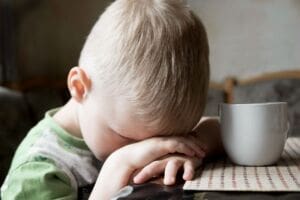 Upset little boy suffering a type of abuse