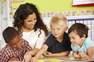 Teacher with children