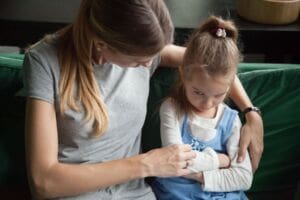 Child mental health being discussed with little girl