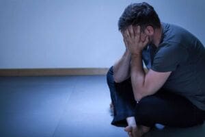 Man struggling with is mental health