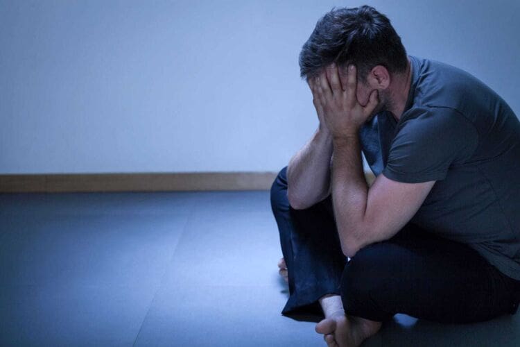 Man struggling with is mental health