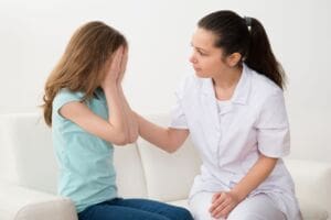 Designated Safeguard Lead talking to child