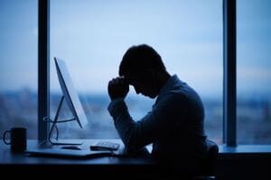 Man suffering with work related stress