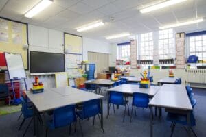 How is RIDDOR implemented in Schools?