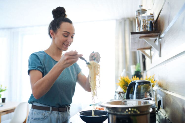 Chef working from home checking food temperature before EHO visitor