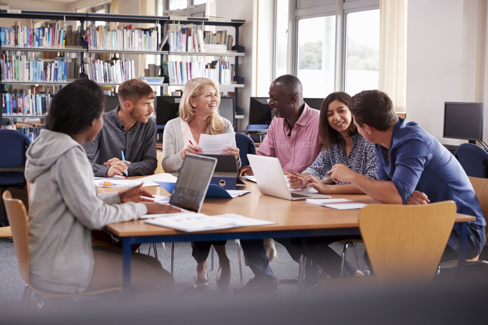 Group Of People Studying Towards A Headteacher Qualification
