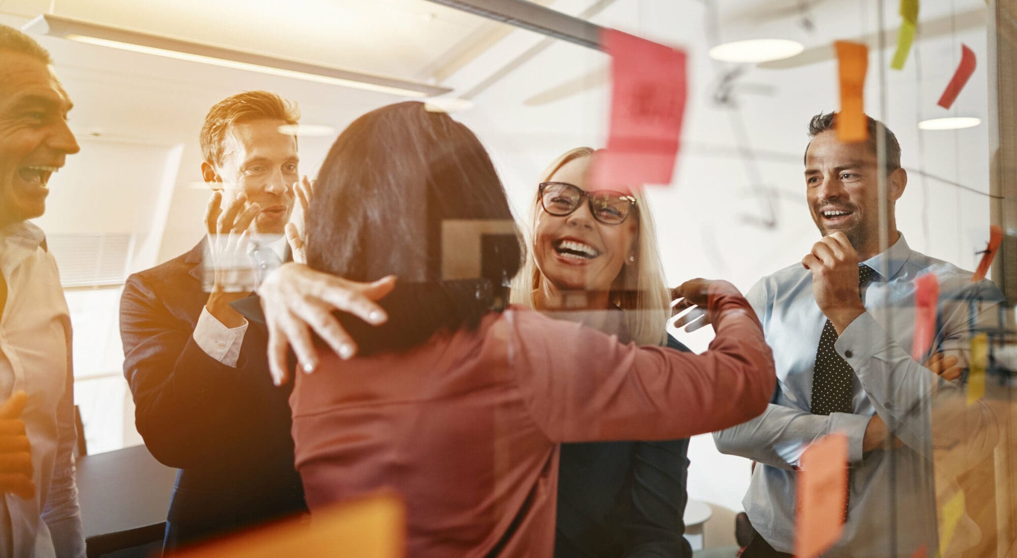 Business team happy as they overtake their competitors Business team happy as they overtake their competitors