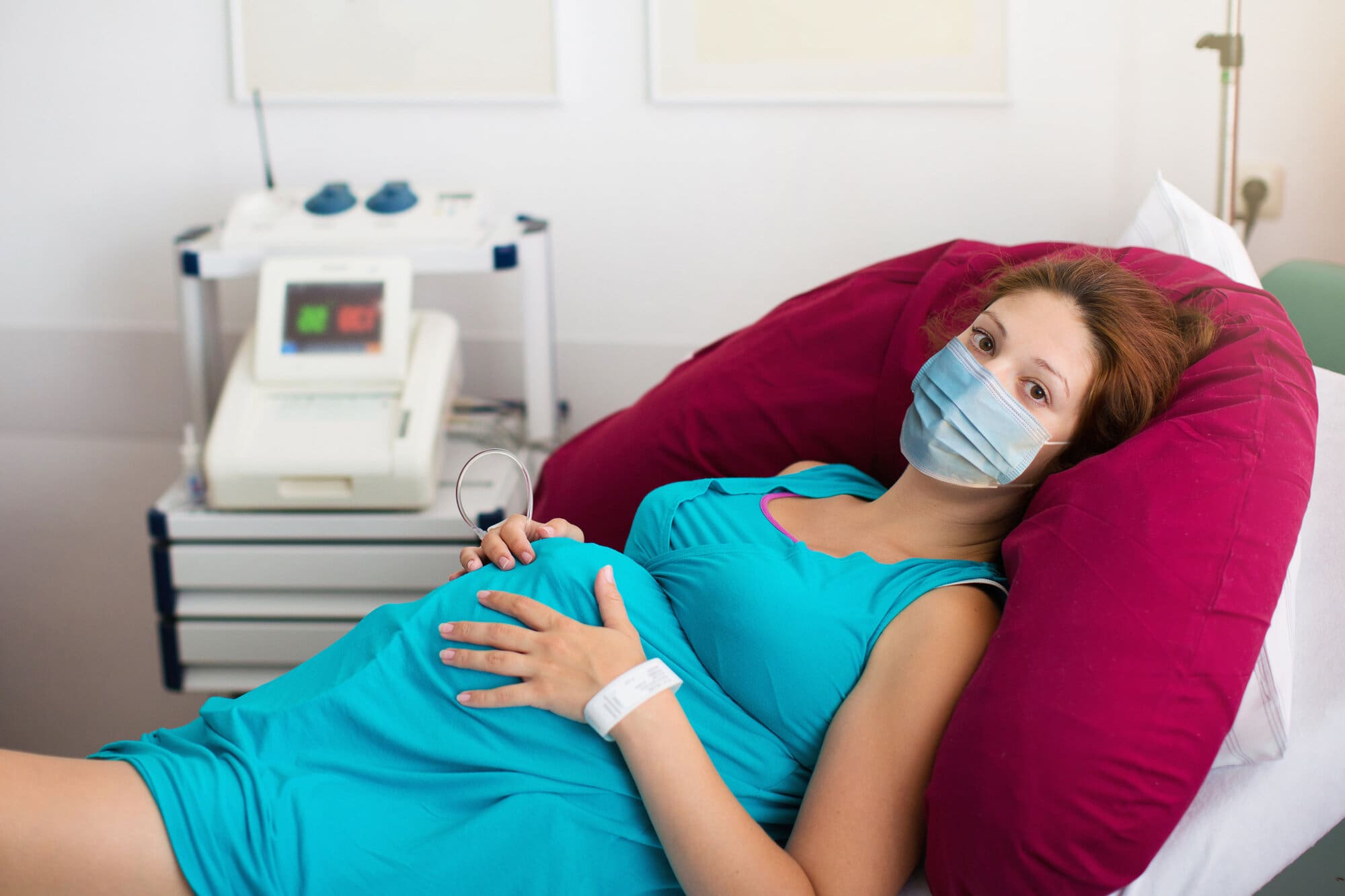 Pregnant woman in labour on hospital ward