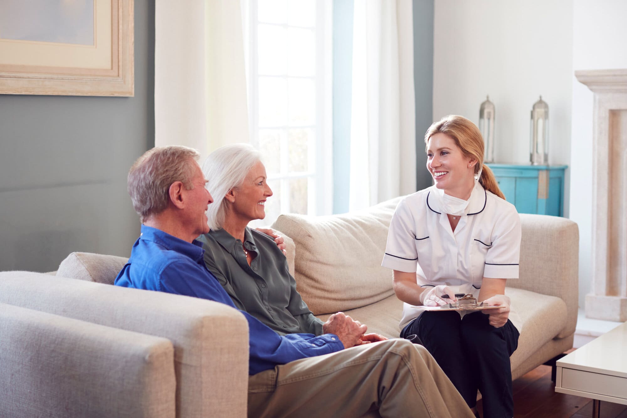 Specialised trained nurse visiting patient at home