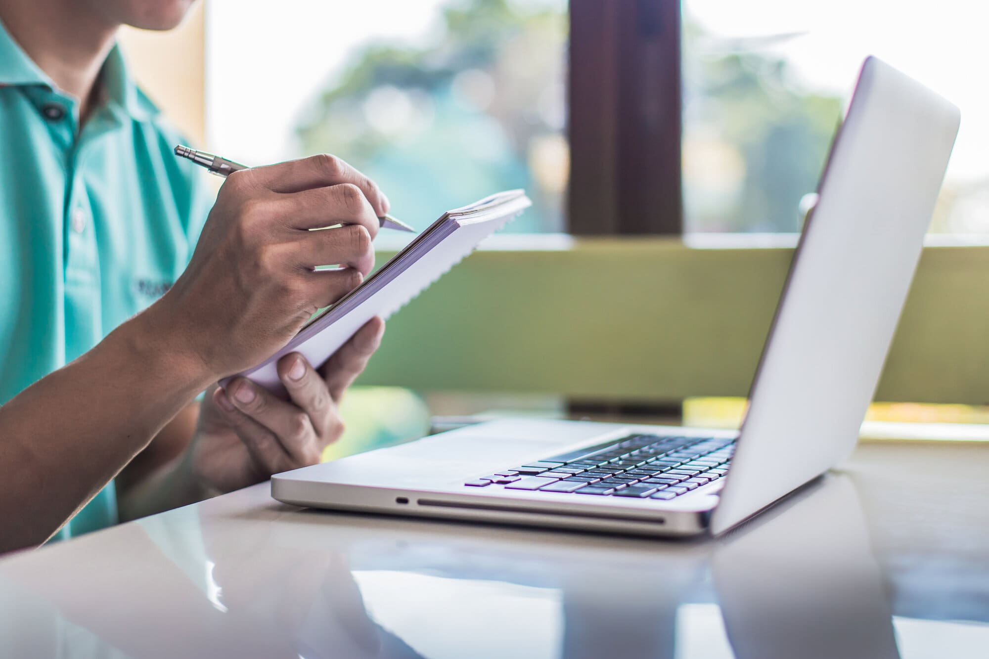 Health visitor worker completing online training courses
