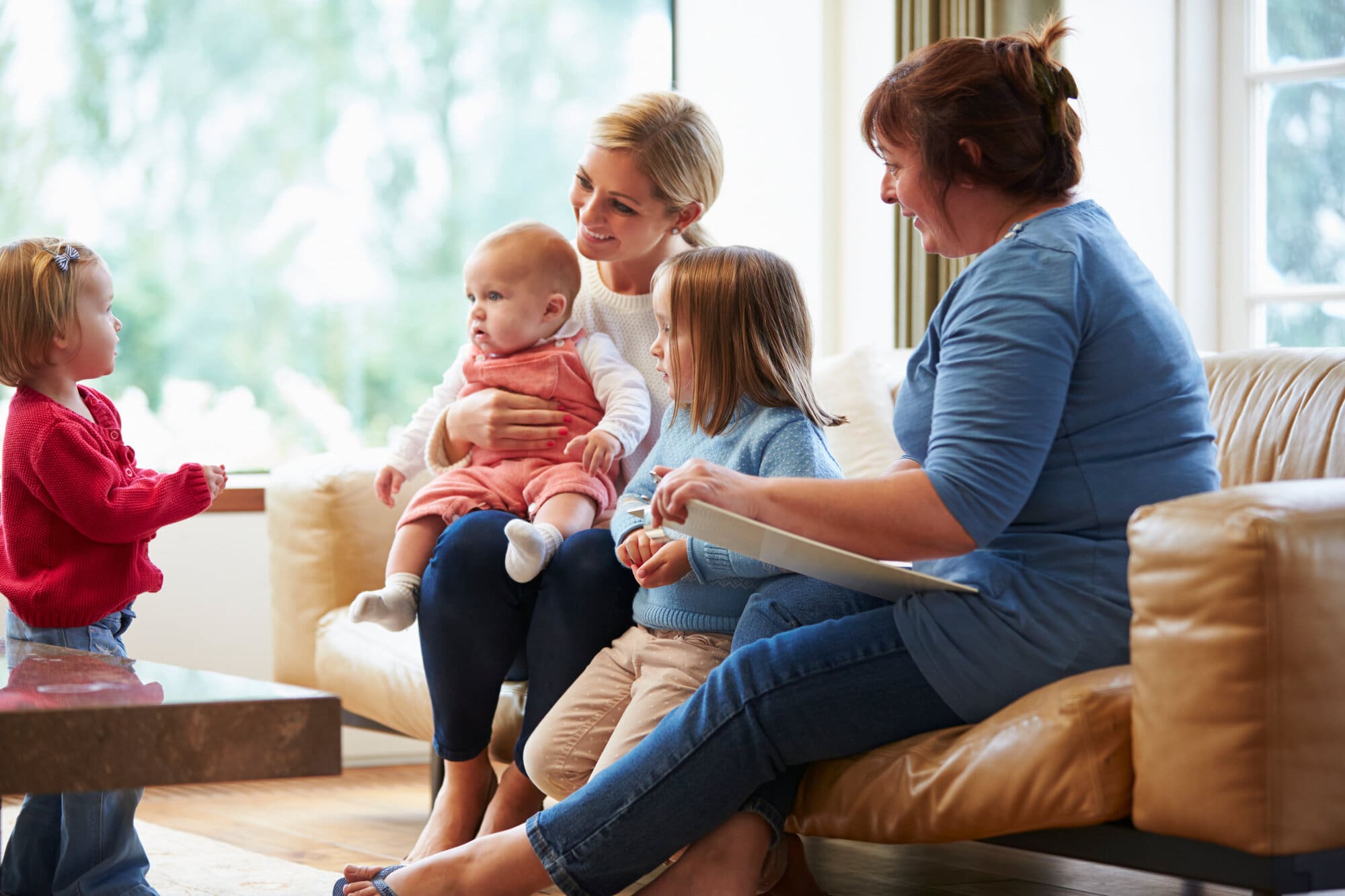 Health visitor working in family home