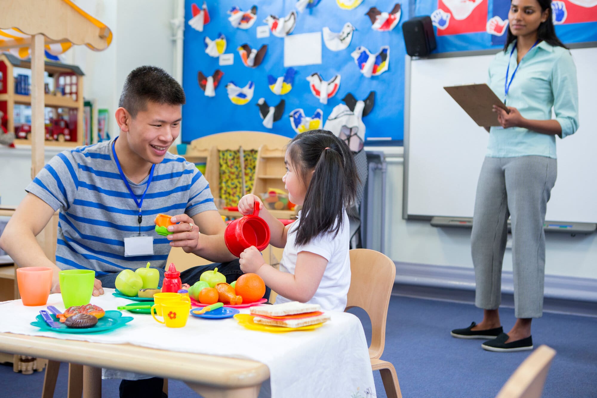 Teaching assistant completing online training