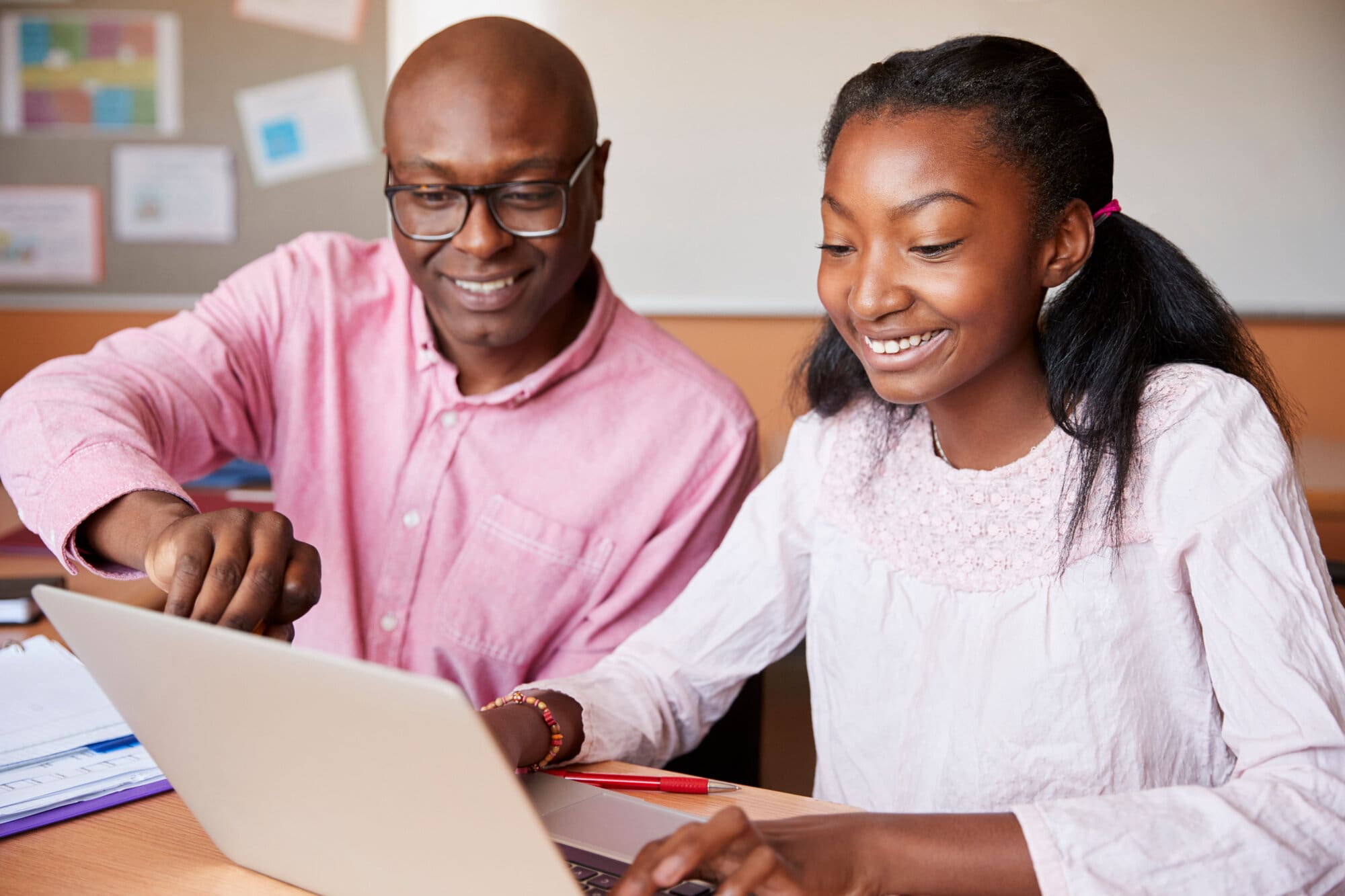 Tutor volunteering after school to mentor student