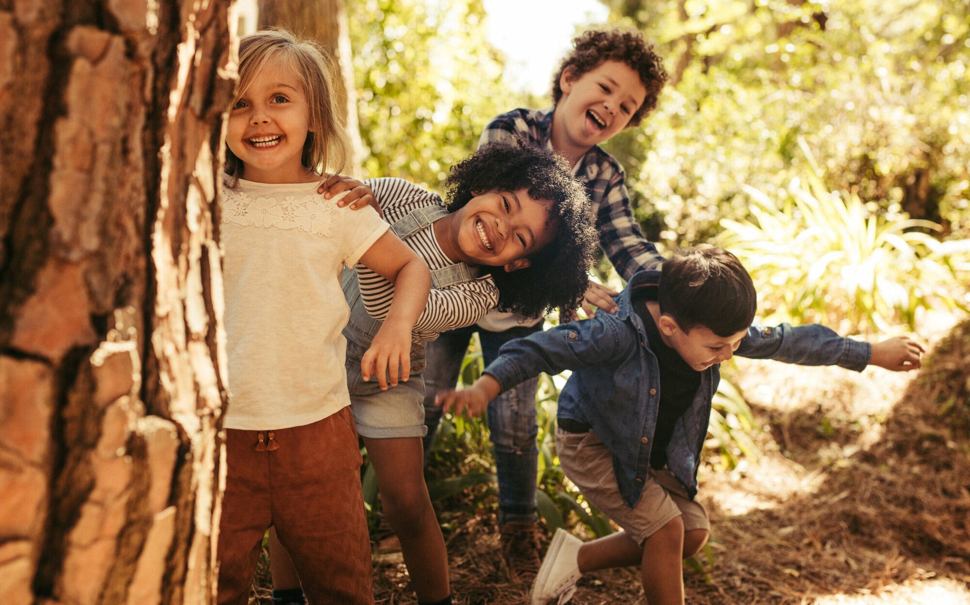 Children experiencing playing outside Children experiencing playing outside