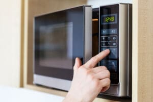 Defrosting food in a microwave