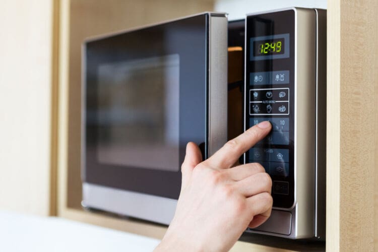 Defrosting food in a microwave