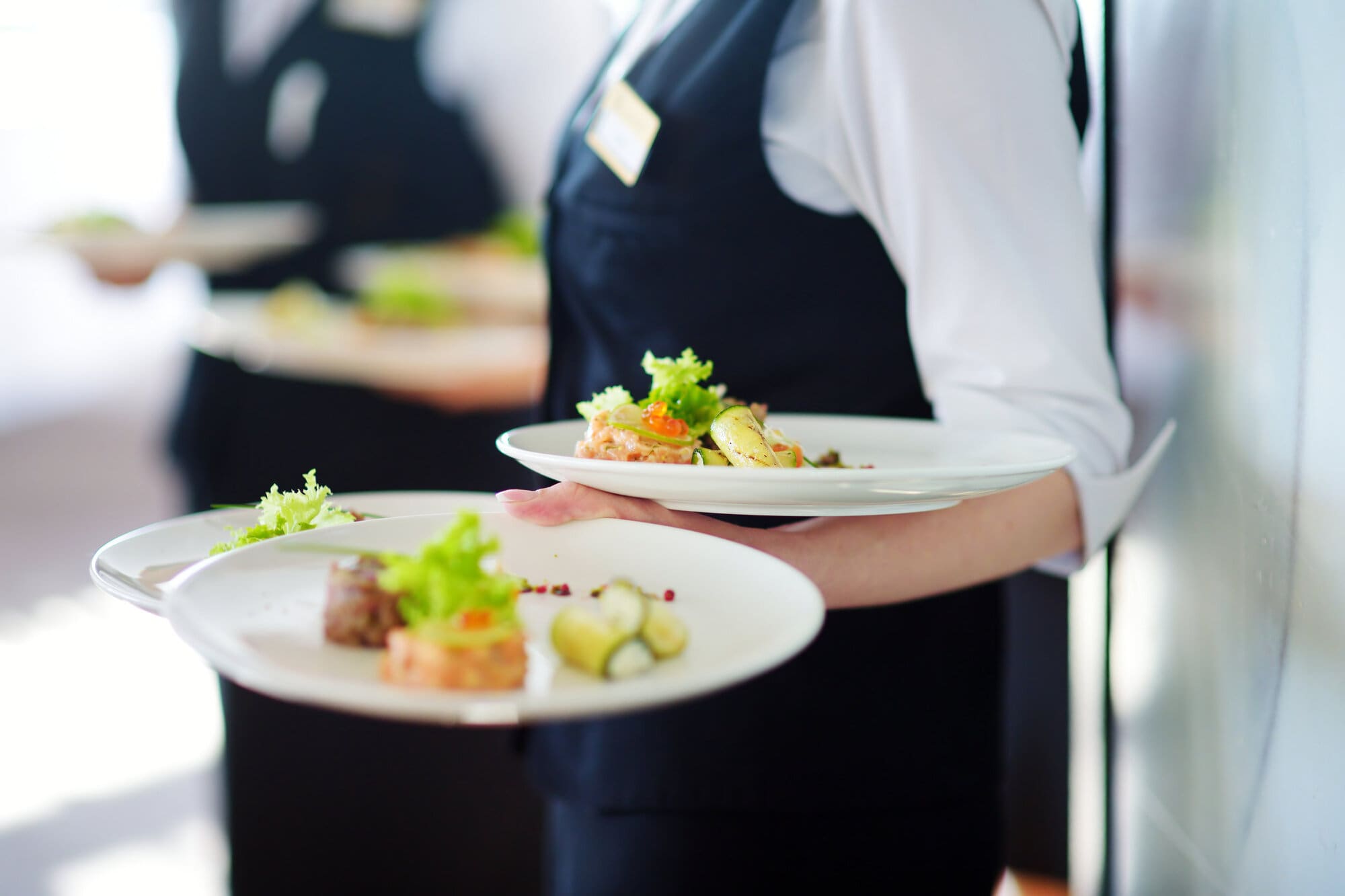 Serving Food In Restaurant