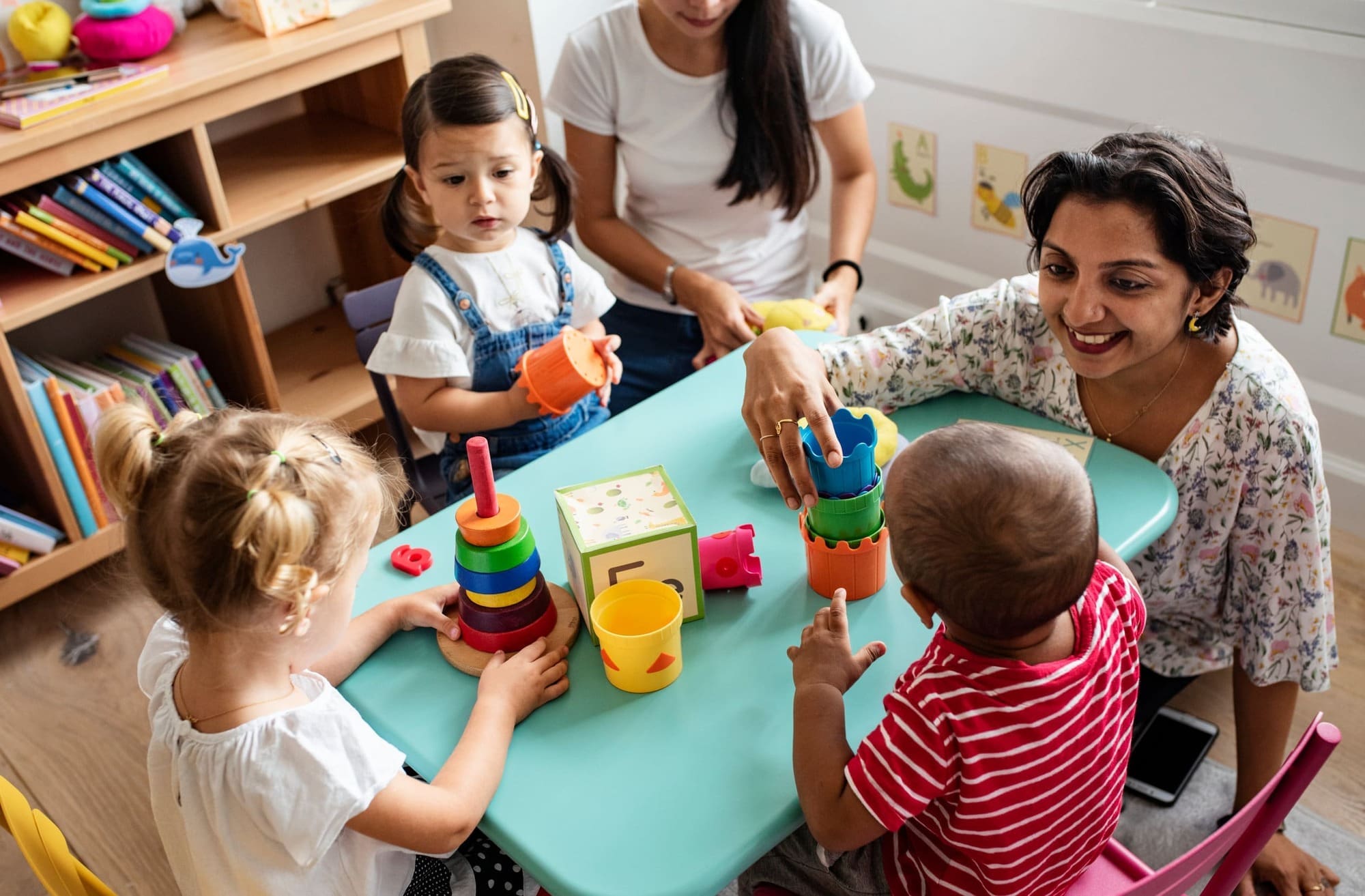 Day nursery staff keeping up high energy