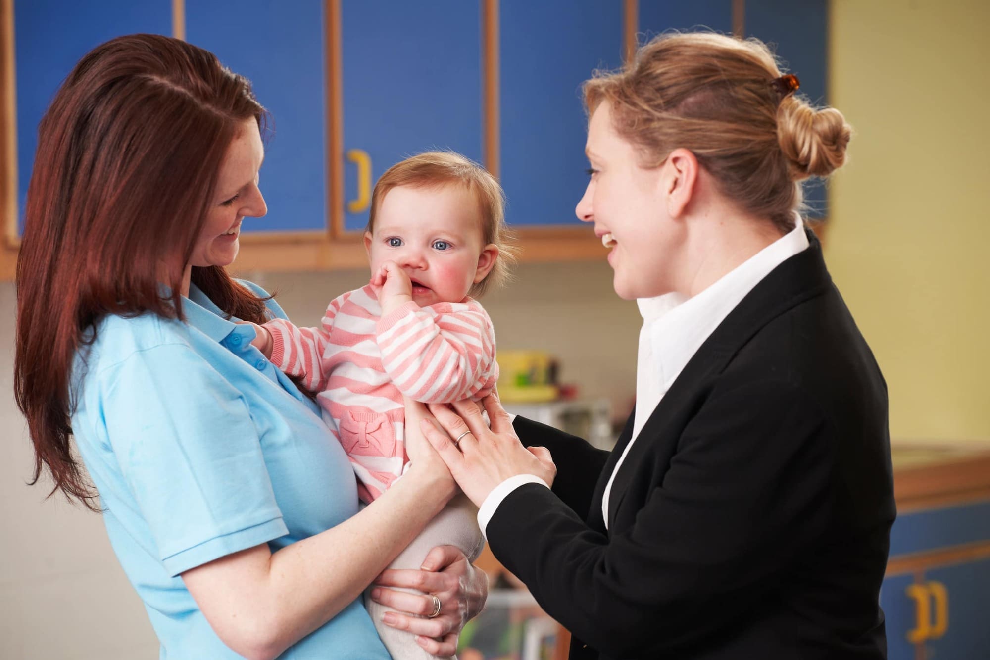Parent leaving child in day nursery