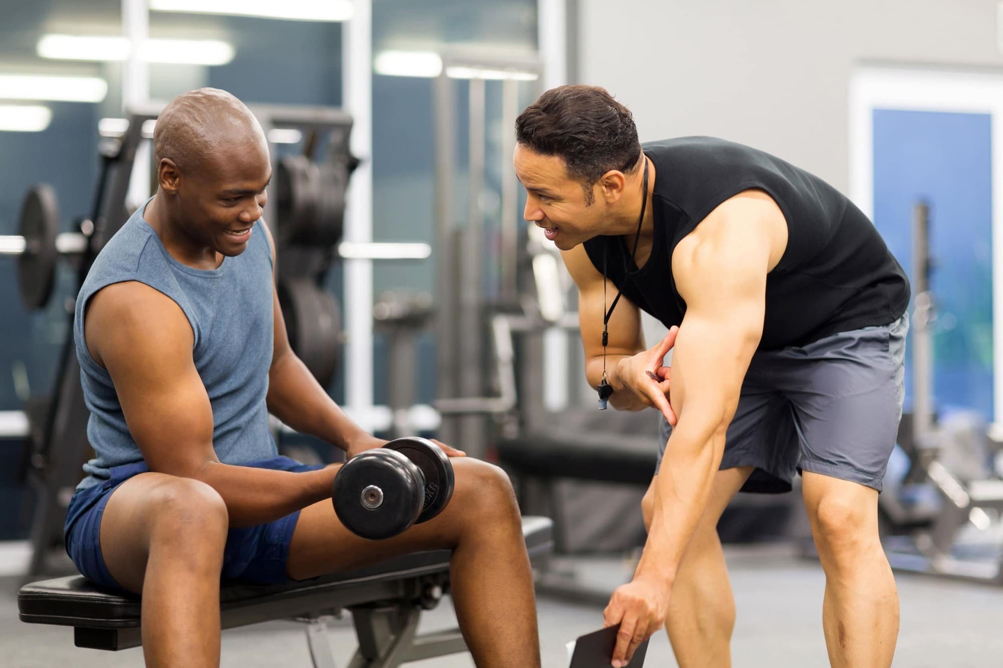 Man with personal trainer