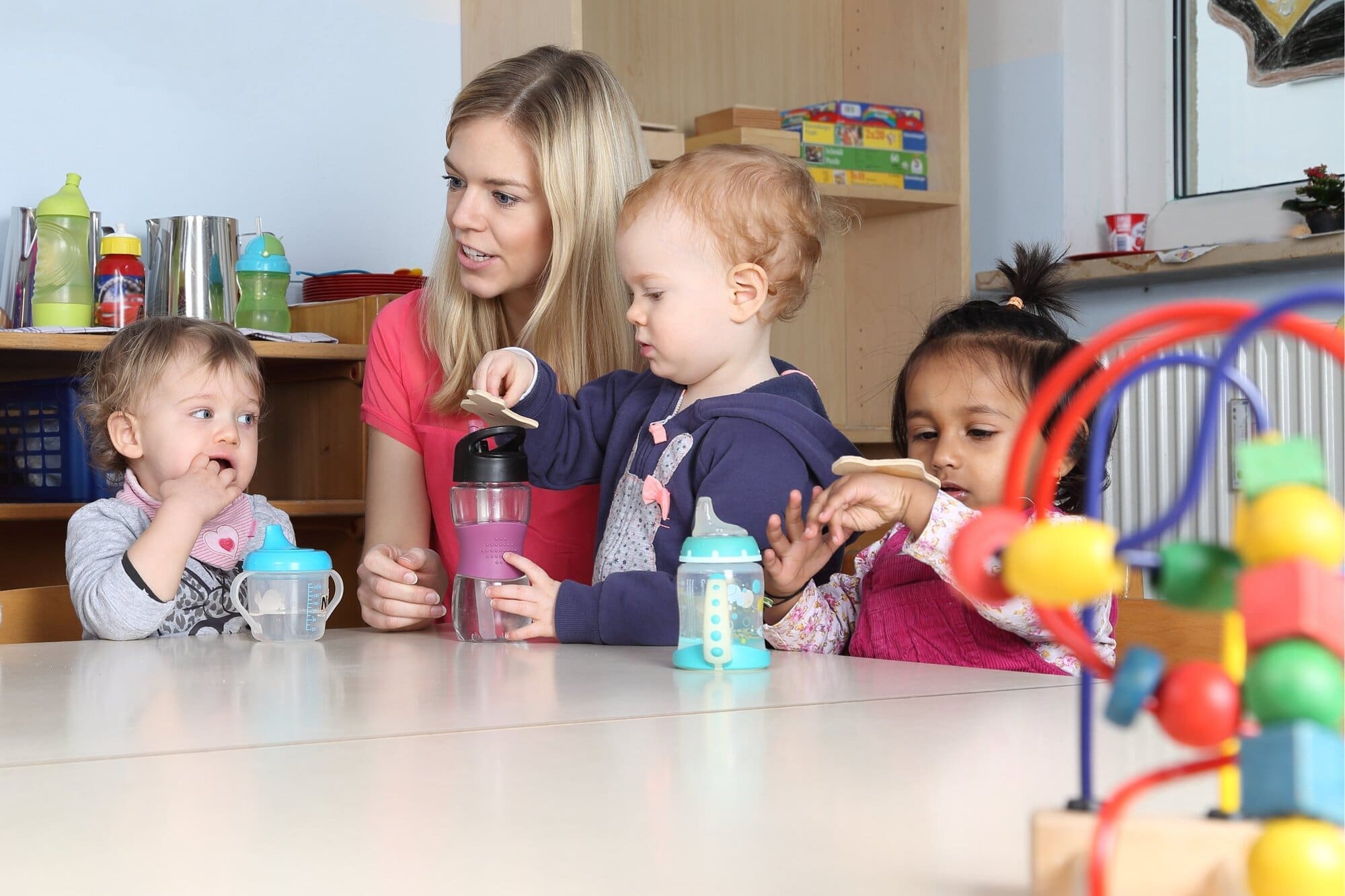 Children's care worker working in daycare centre