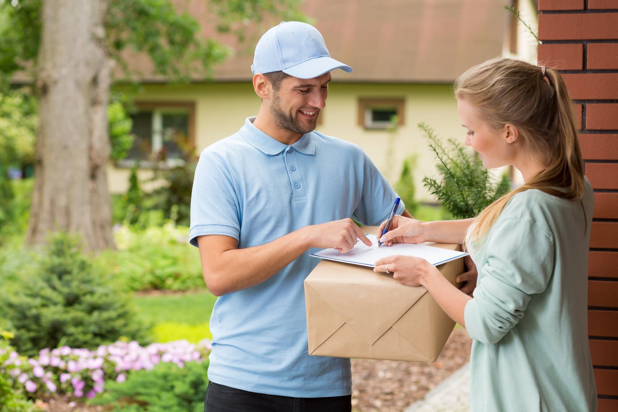 Courier delivering parcel