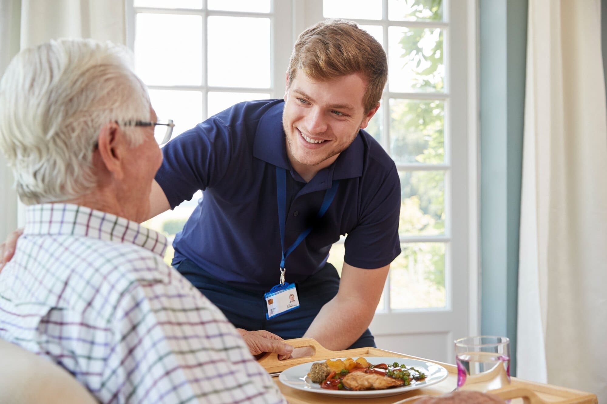 Home care worker preparing meal