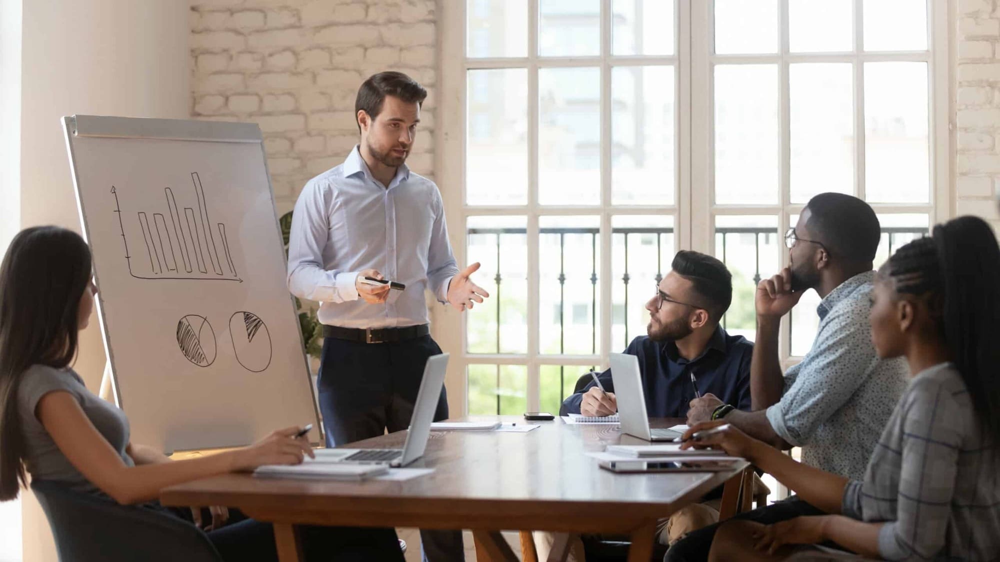 T-shaped employee working with their team T-shaped employee working with their team