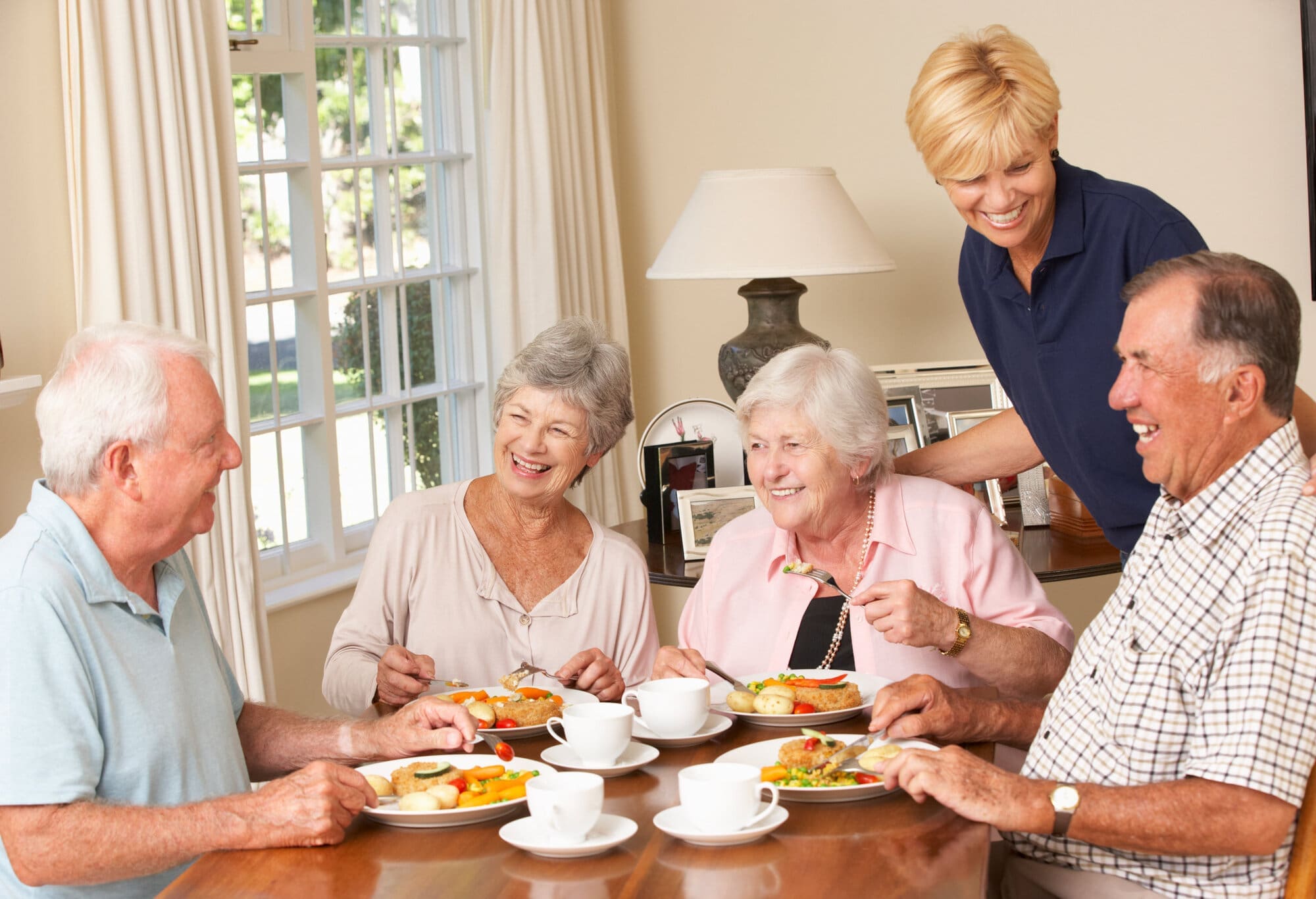Care home residents eating