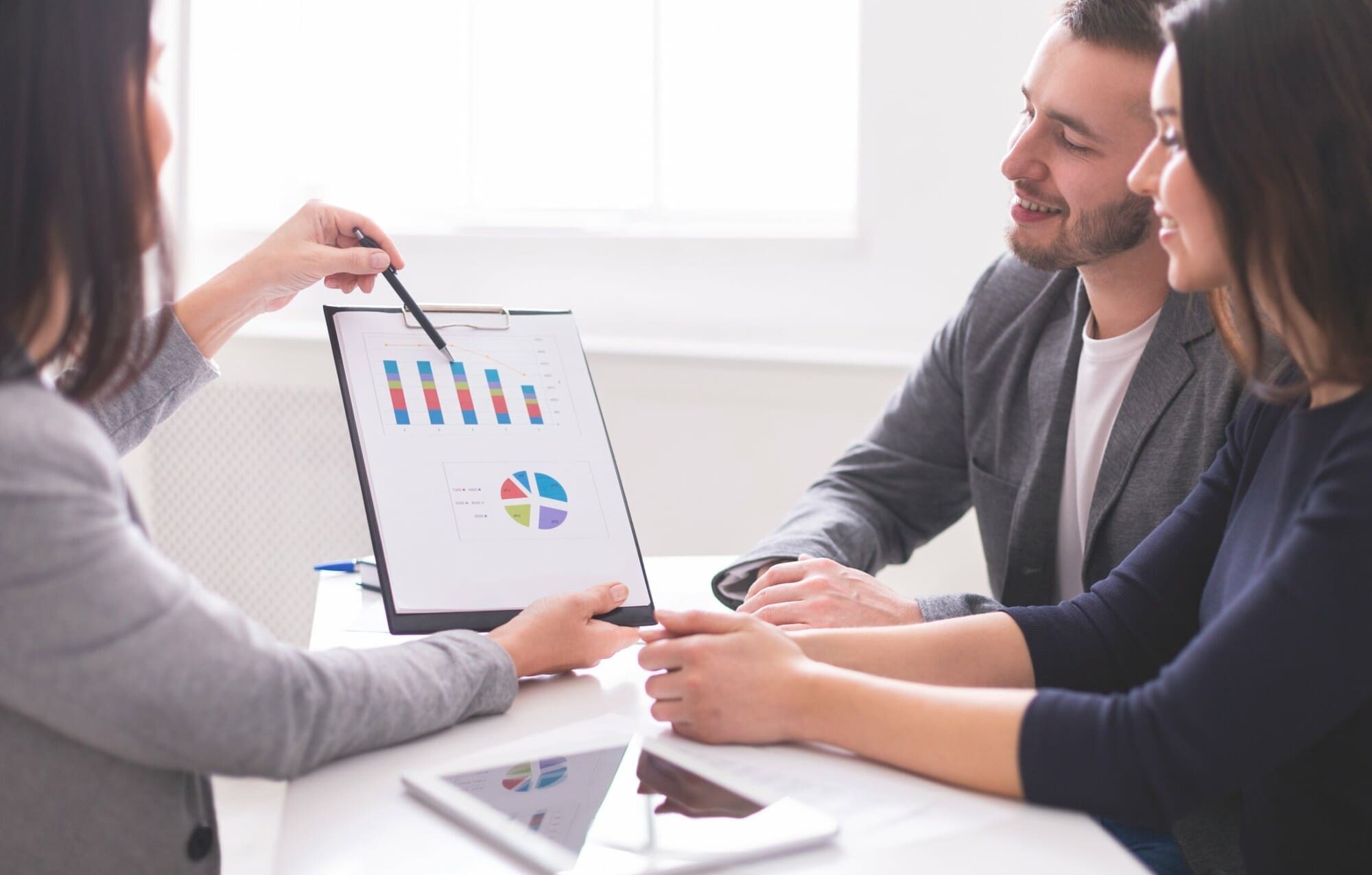 Financial adviser meeting with clients