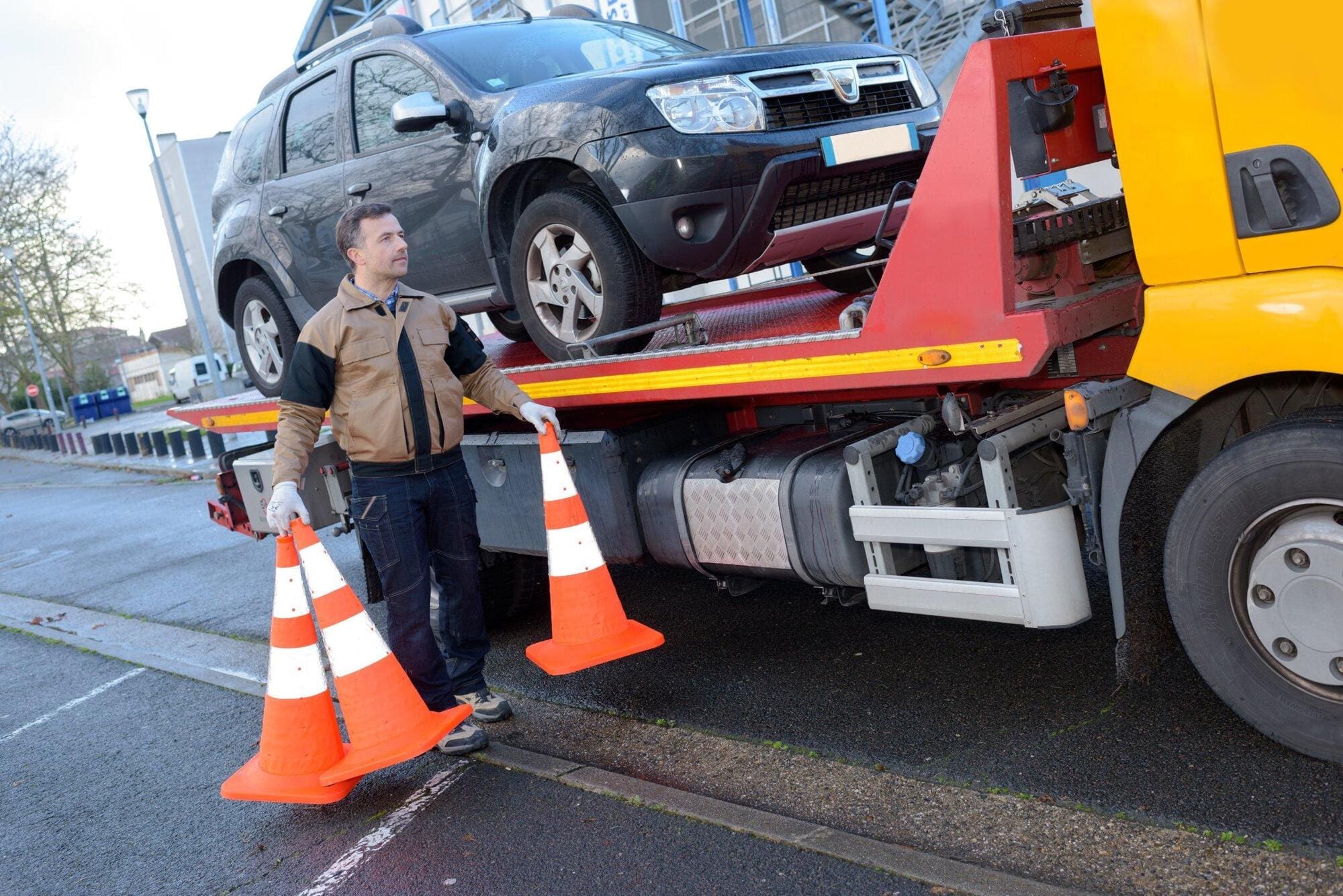 HGV driver working with transporting cars