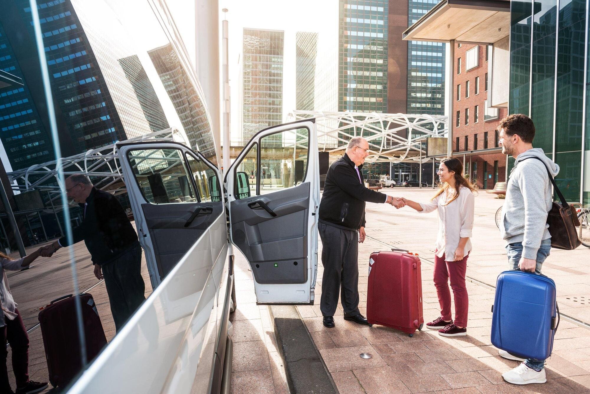 Holiday rep meeting holidaymakers at airport