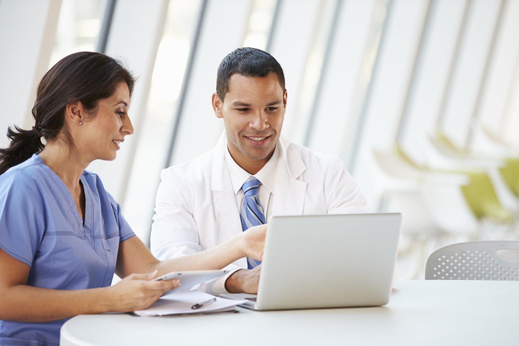 Hospital doctor taking online training courses