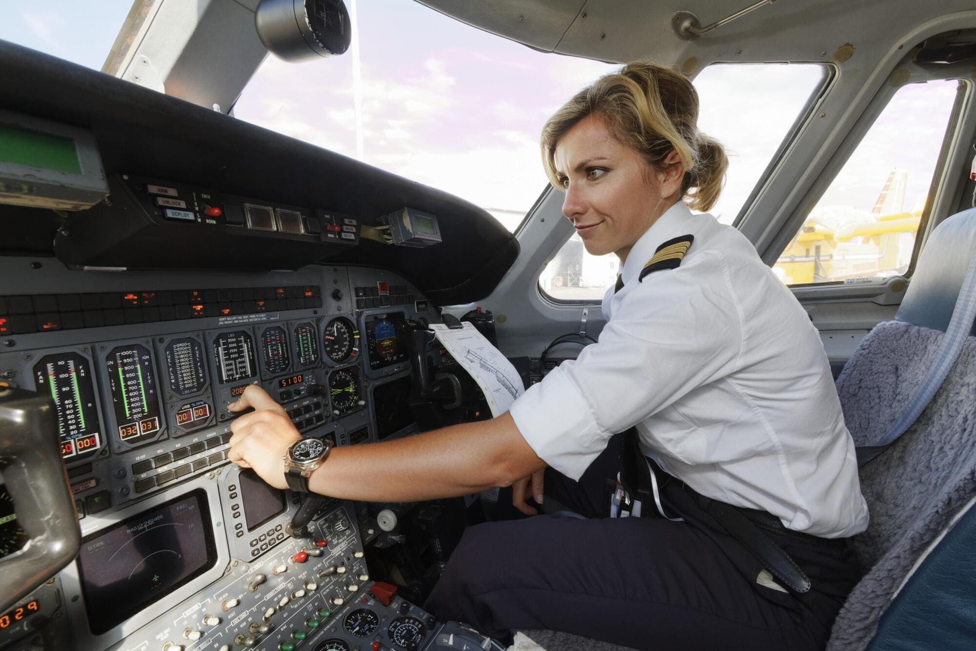 Pilot checking safety systems Pilot checking safety systems