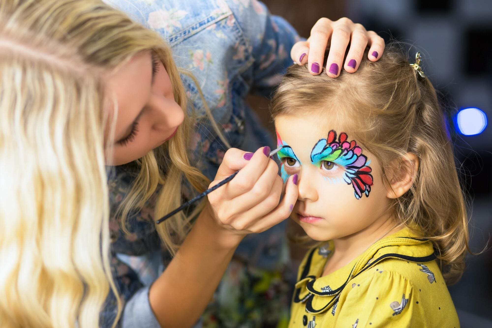 Volunteering for community event with face painting