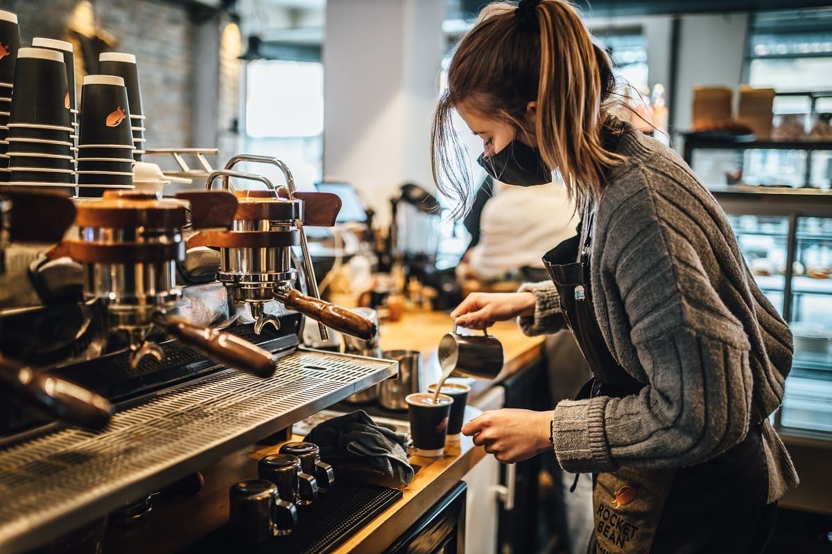 Barista working after gaining experience