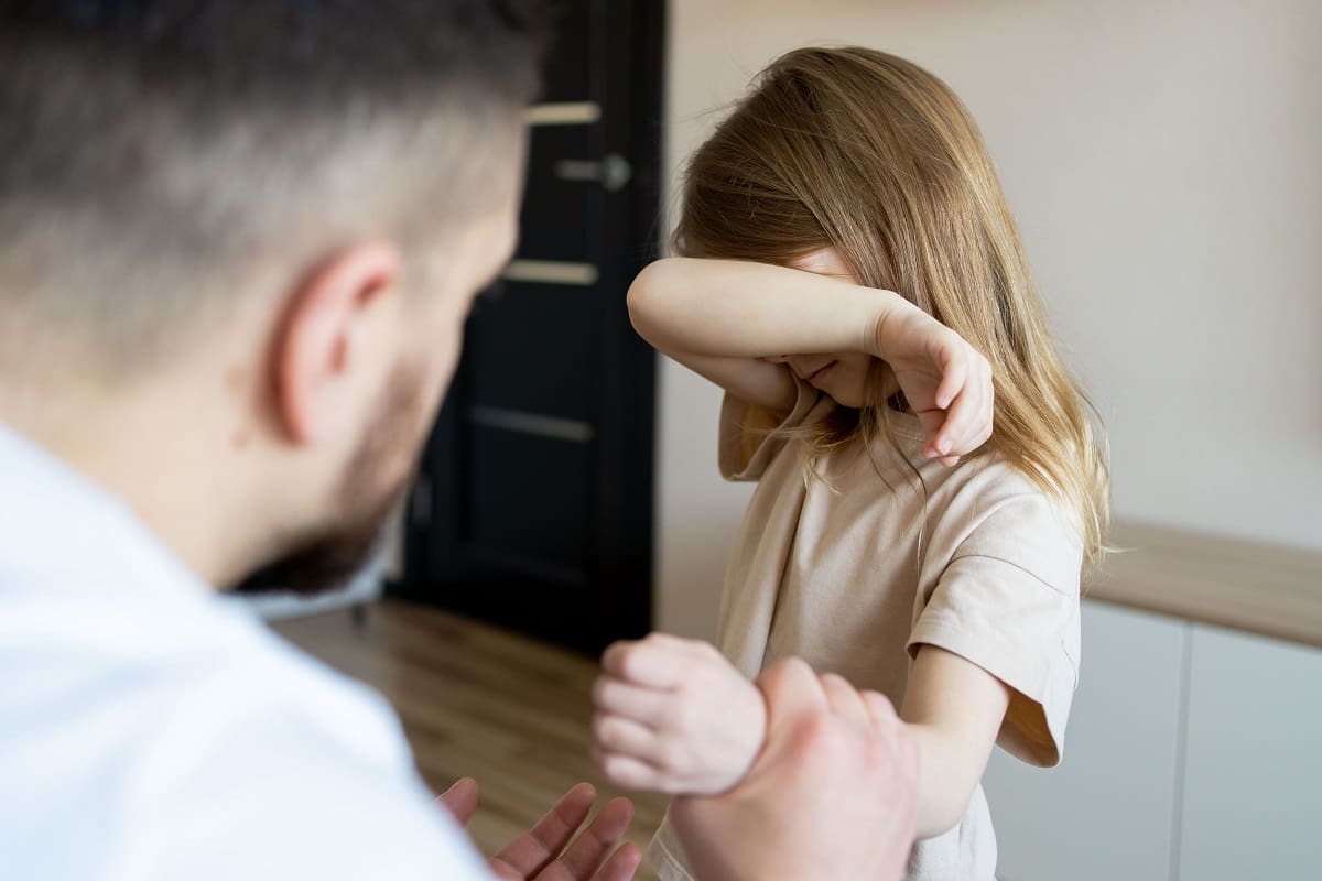 Scared child at risk of abuse