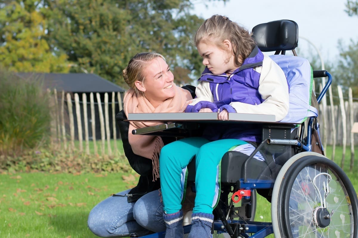 Disabled child with mum