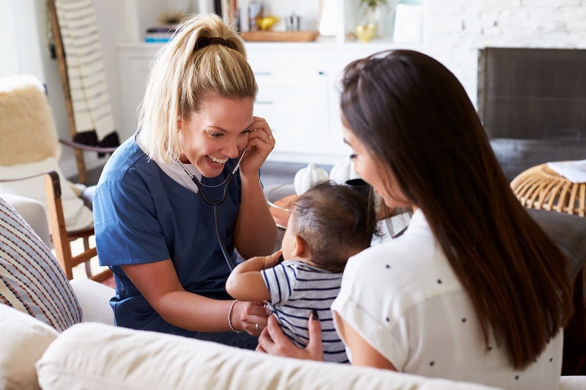 Community nurse visiting child