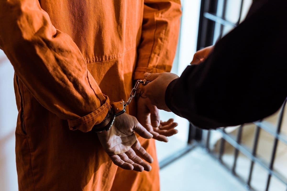 Prison officer following legislation