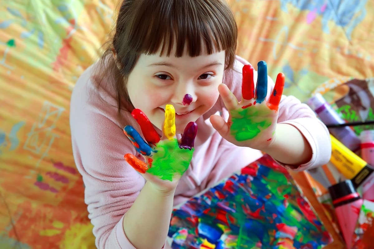 Child with learning disabilities playing