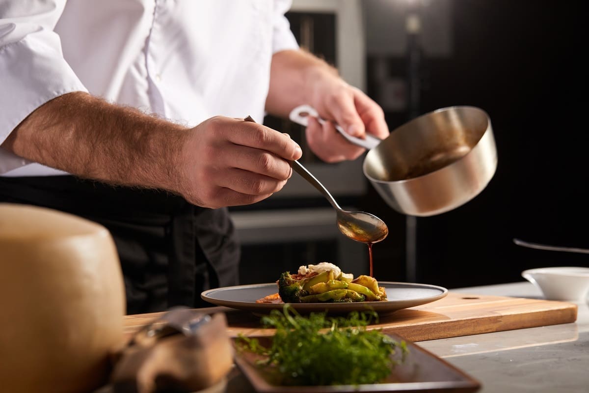 Commis chef specialising in making sauces