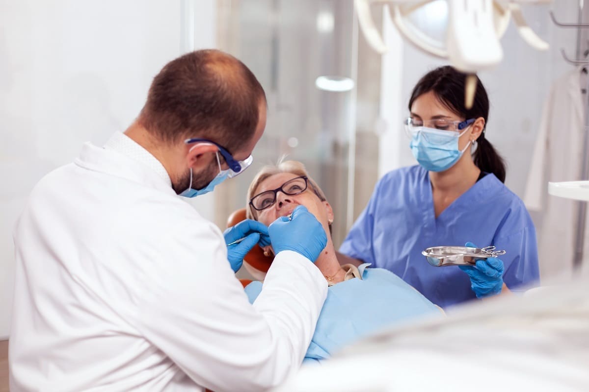 Dental nurse working in nursing home