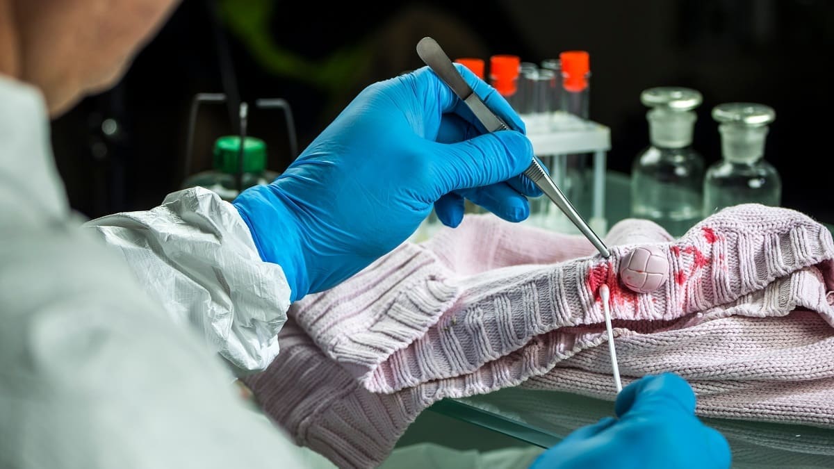 Forensic scientist working in forensic department