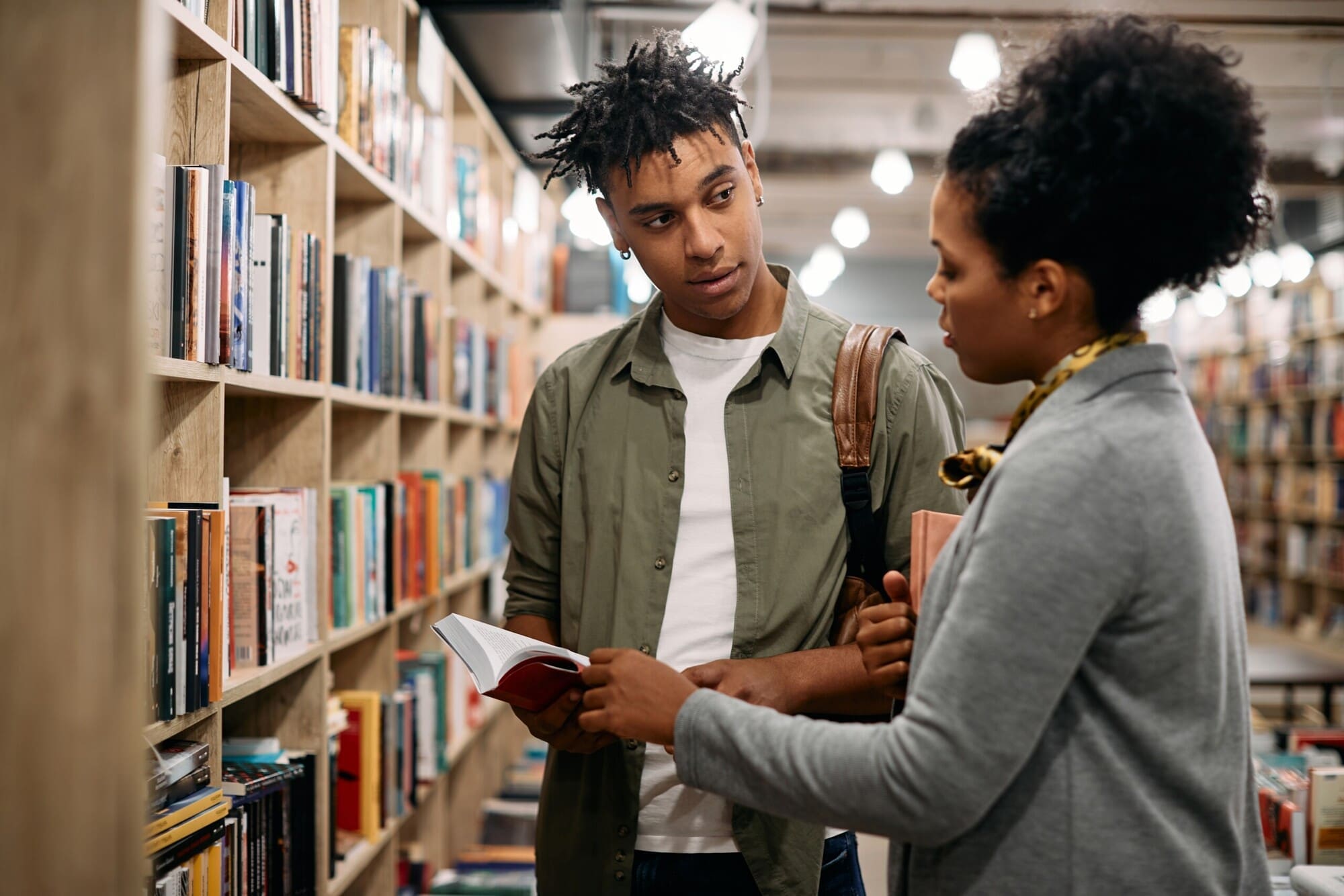 Librarian Helping Customer Find Book
