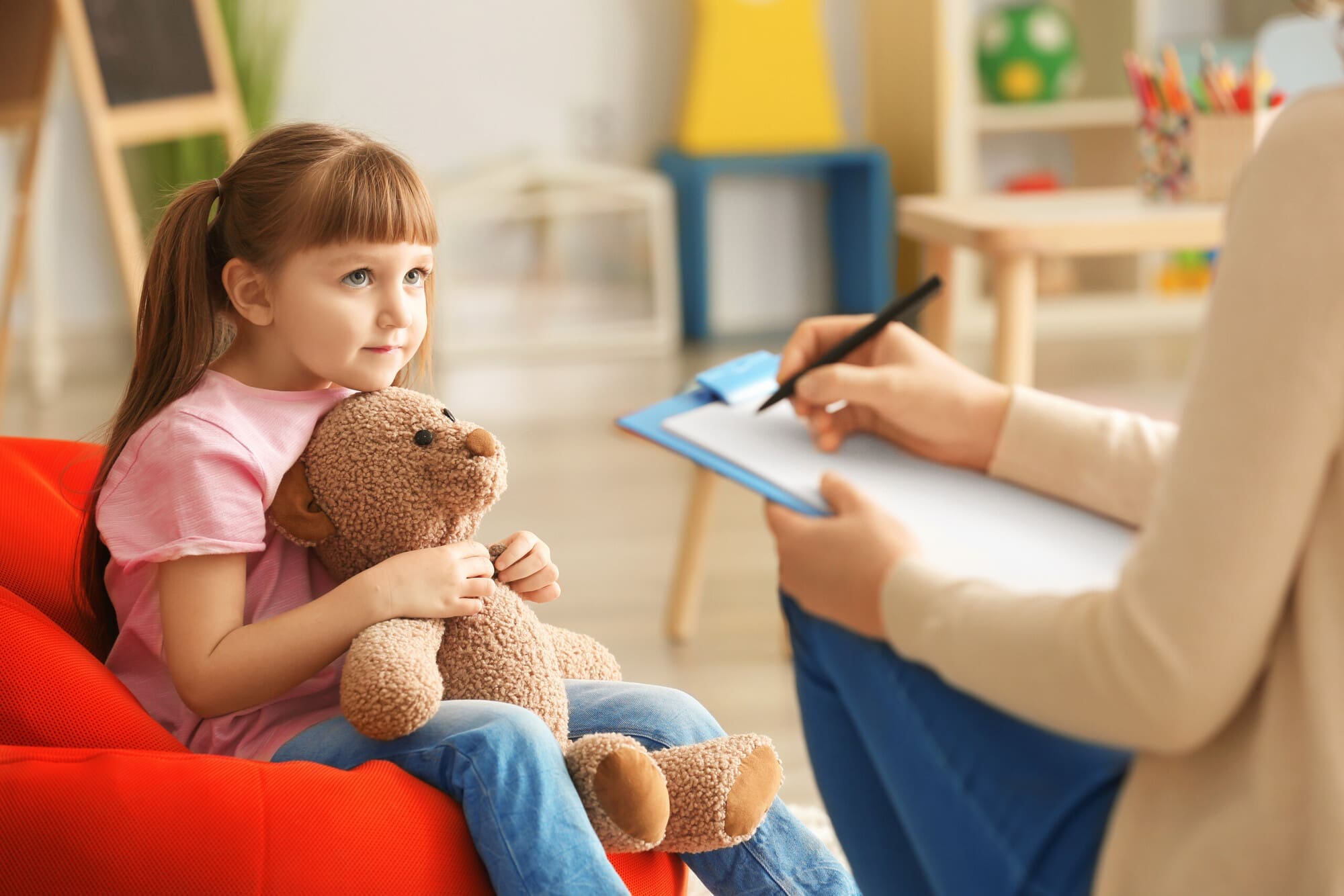 Child Speaking with Psychologist