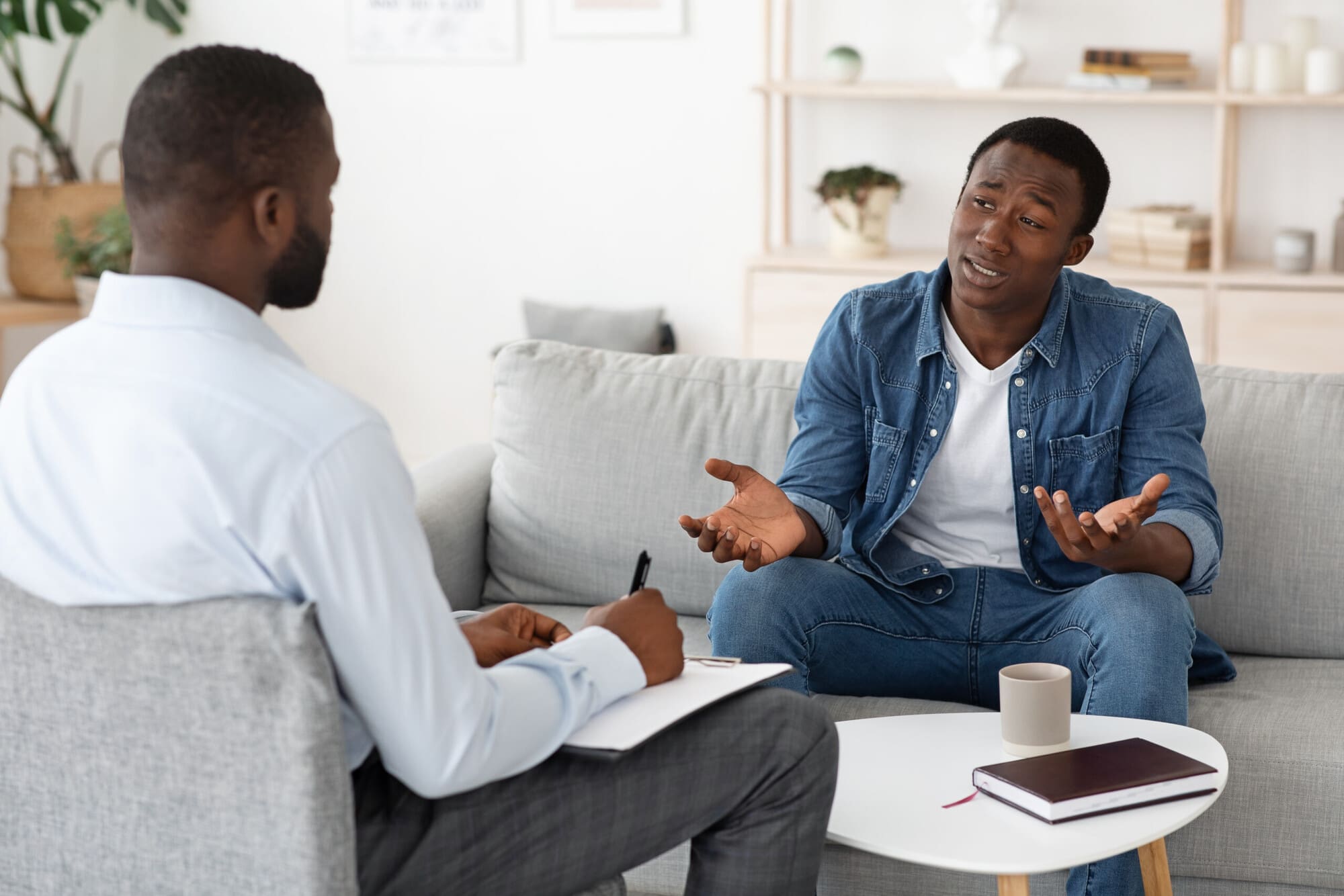 Psychiatrist speaking with patient