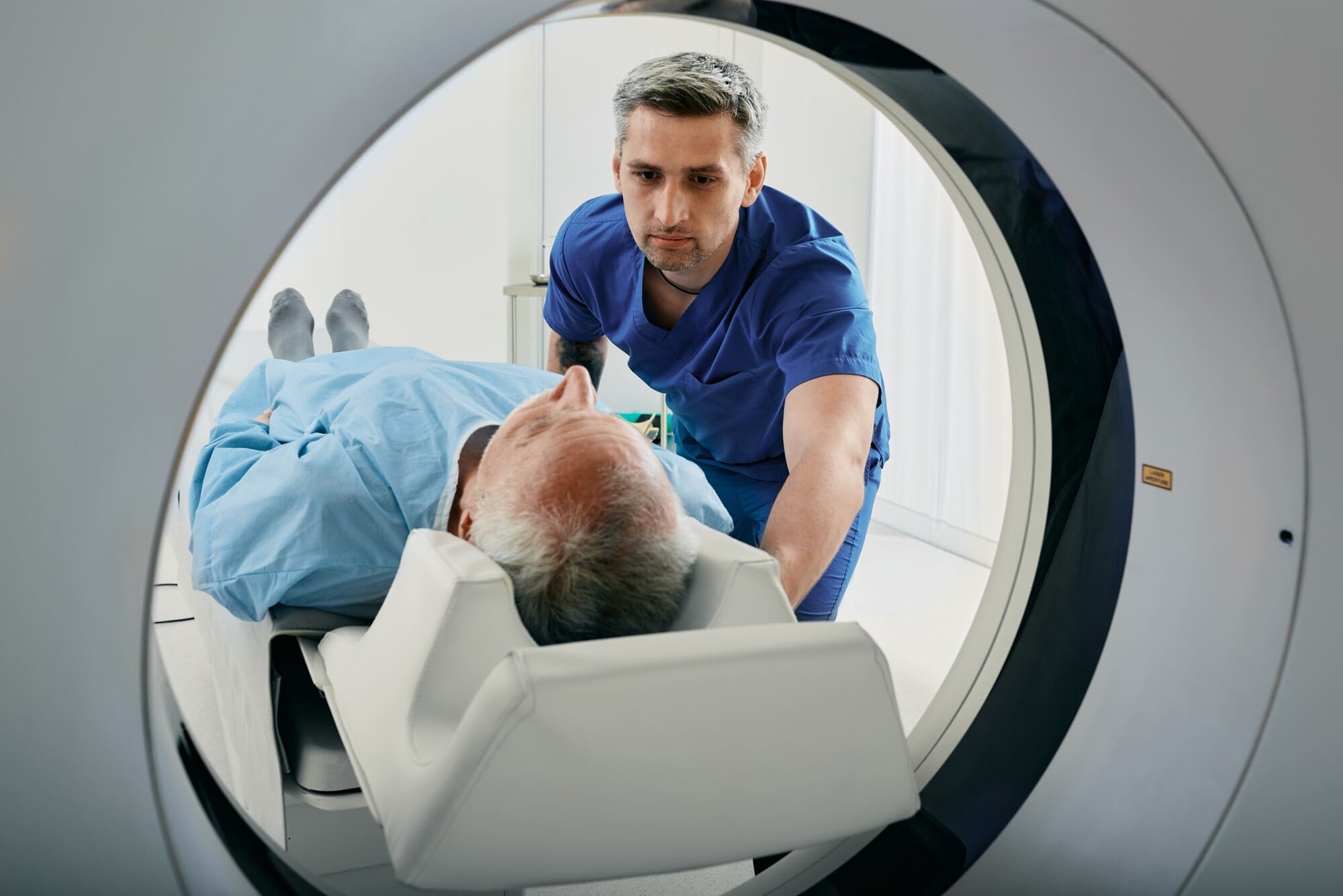 Radiographer Preparing Patient