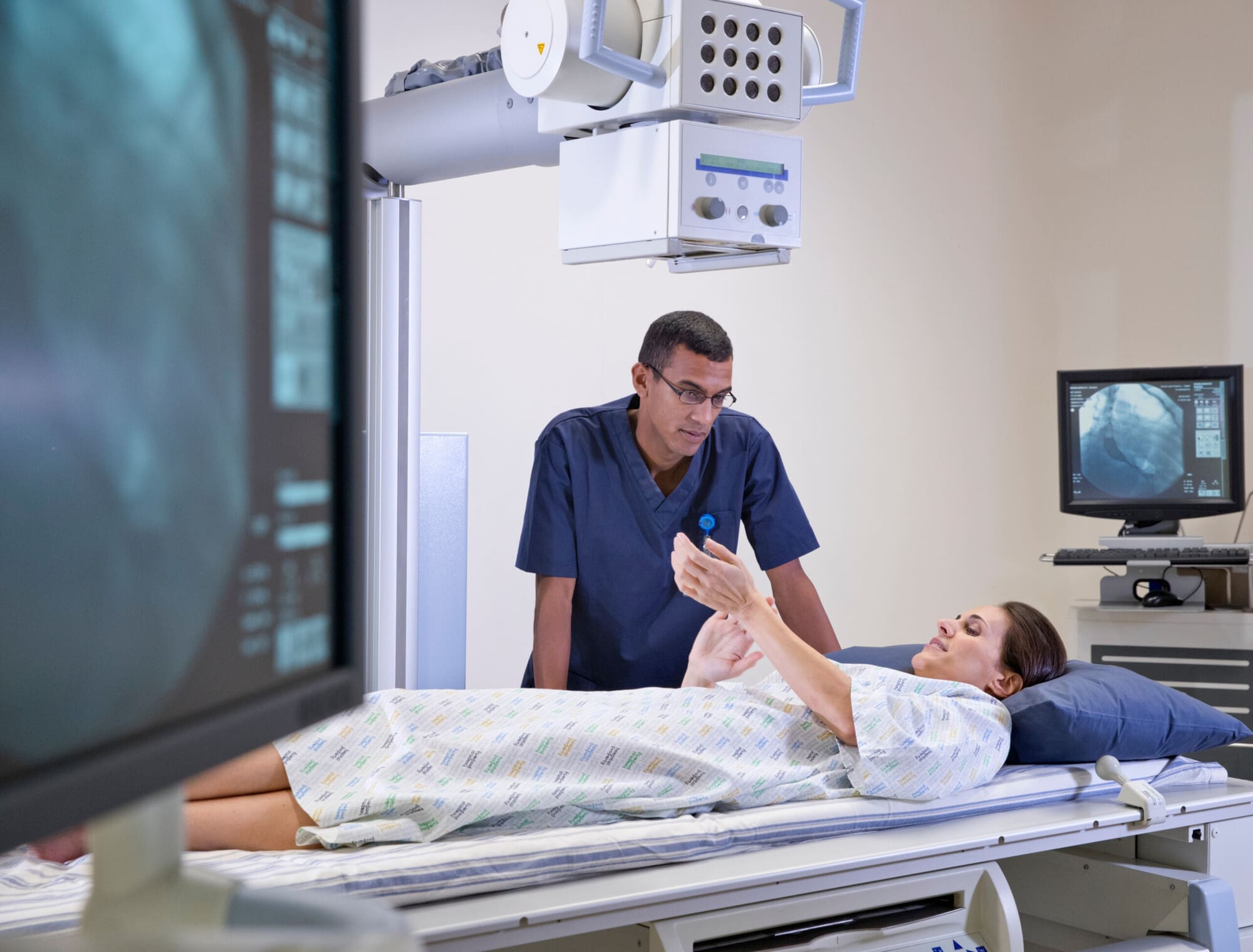 Radiologist With Patient